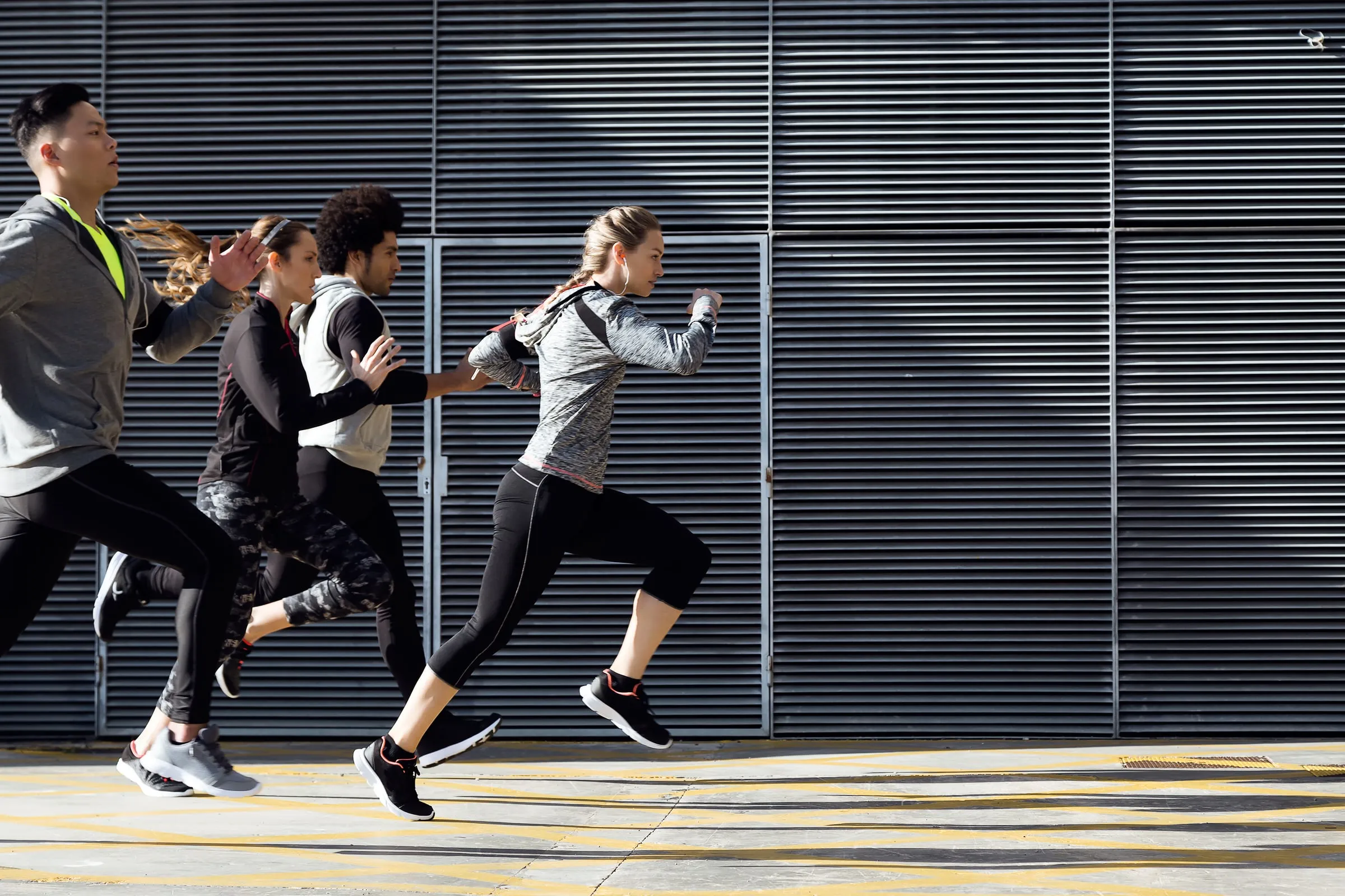 People running to Top Performance Physio Chatswood